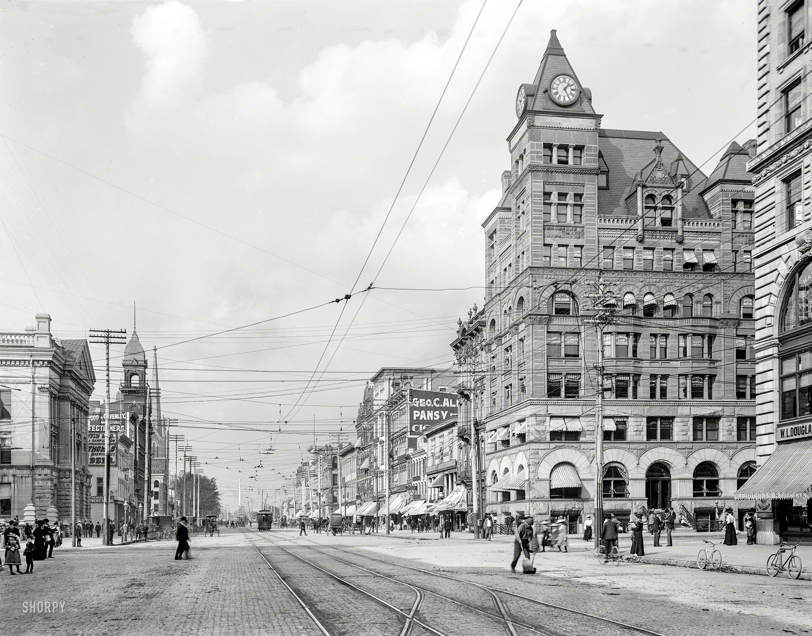Circa 1902. "Main Street -- Dayton, O." No. 2 with a broom. 8x10 inch dry plate glass negative, Detroit Publishing Company. View full size.