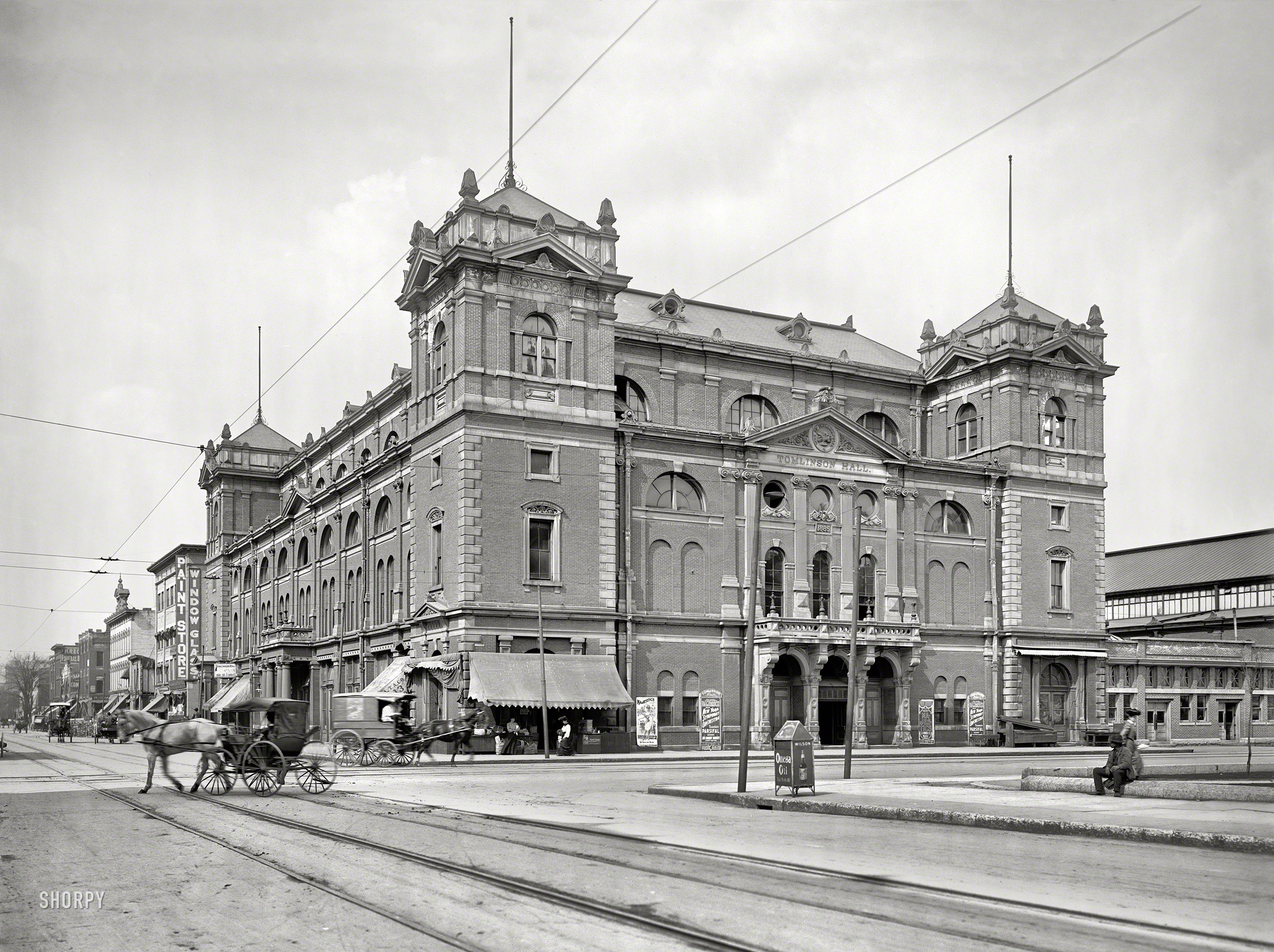 &nbsp; &nbsp; &nbsp; &nbsp; Demolished in 1958 after being gutted by a four-alarm fire.
Indianapolis, 1904. "Tomlinson Hall, Delaware and Market streets." Continuing our visit to Indiana's capital city, with the second "Omega Oil" waste bin in as many days. 8x10 inch glass negative, Detroit Photographic Co. View full size.