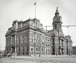 1904. "Courthouse -- Columbus, O." Continuing today's Columbian theme. 8x10 inch dry plate glass negative, Detroit Publishing Company. View full size.
What a treasure this building could have been todayif it had not been torn down in the 1960s.  The spot where it used to sit on South High Street is now open space and an ugly concrete parking garage.  Thankfully many of the showpiece Ohio county courthouses from that period still survive, including one very similar in style but a bit smaller in London, Madison County, just west of Franklin County (Columbus).
I&#039;ll Never Fully UnderstandWhy buildings like this get destroyed and replaced with hideous concrete and glass monstrosities.  Progress, I guess.
DownspoutitisA truly fine looking building but it seems the architect ignored downspouts on the preliminary plans and where only added later when the Chief Justice's wife almost drowned from a waterfall deluge from the roof during a late summer afternoon thunderstorm.
(The Gallery, DPC)