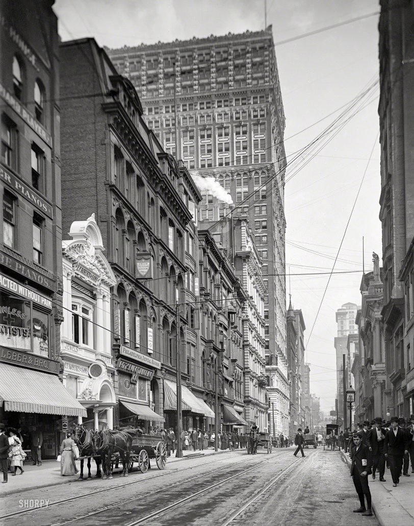 1904. "Fifth Avenue, Pittsburg, Pa." Address of the Philadelphia Dental Rooms, on what seems to have been Pittsburgh's go-to street for Painless Dentistry. Looming over it all is the recently completed Farmers Bank building. View full size.
