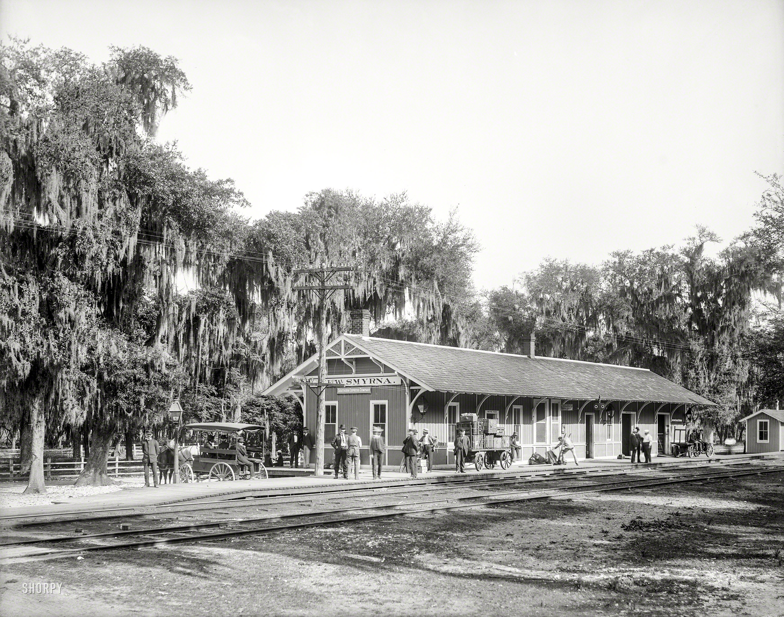 1904. "East Coast Railway station, New Smyrna (Beach), Florida." 8x10 inch dry plate glass negative, Detroit Publishing Company. View full size.