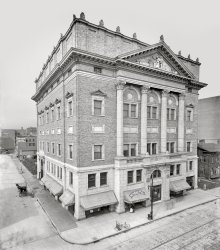 Rochester, New York, circa 1906. "Masonic Temple, North Clinton Avenue and Mortimer Street." District headquarters of the Free & Accepted Masons, whose retail tenants include Wunder Tailor, Nusbaum's Lining Store, E.J. Egbert & Co. and Underwood Typewriter. This imposing edifice, completed in 1902, was razed in 1932 to make room for a movie theater parking lot. 8x10 inch dry plate glass negative, Detroit Publishing Company. View full size.