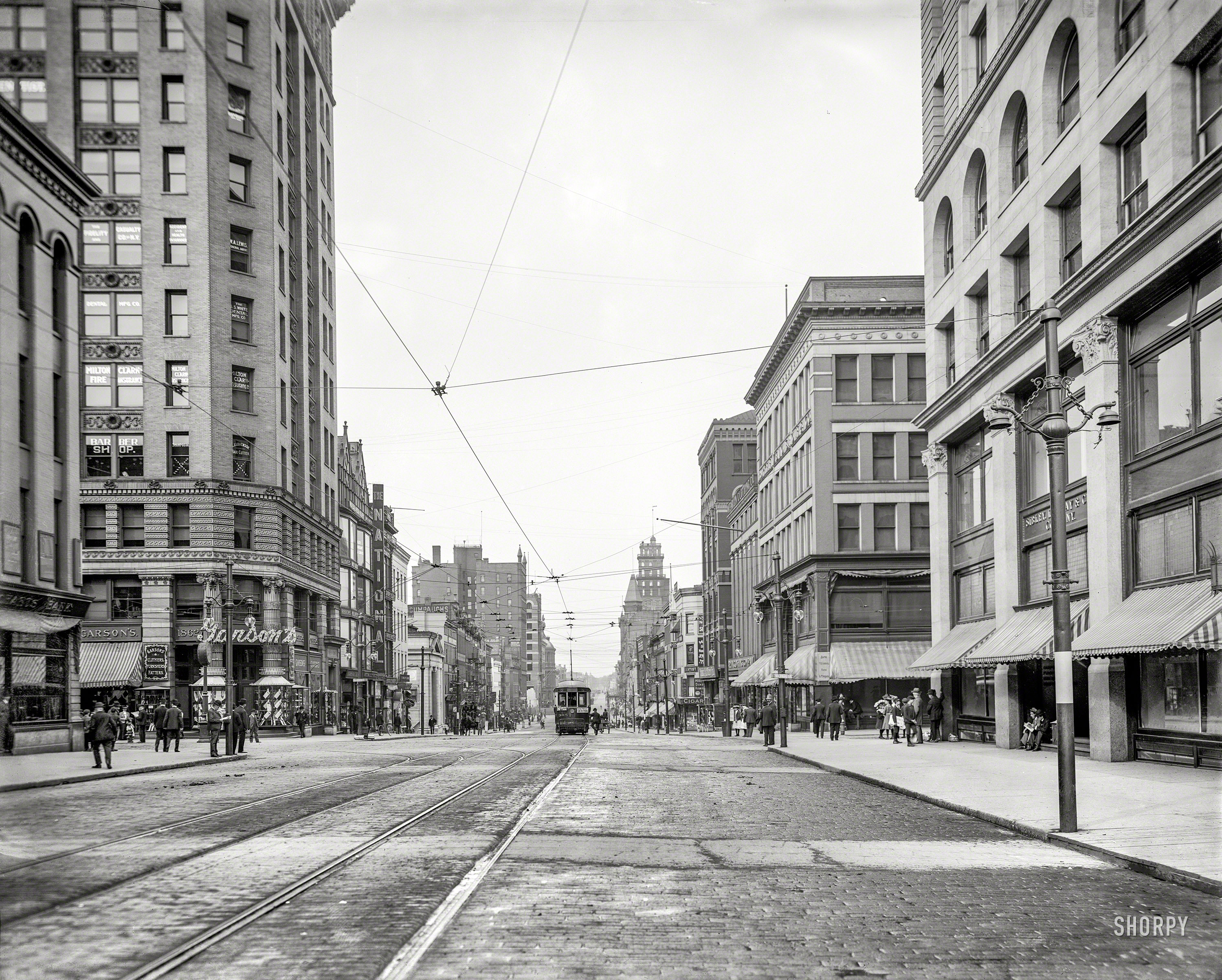 Rochester, New York, circa 1904. "East Main Street at South Avenue and St. Paul Boulevard." A sartorial crossroads anchored by Garson's Clothiers. 8x10 inch dry plate glass negative, Detroit Photographic Company. View full size.
