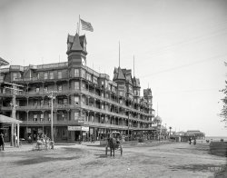 1904. "Hotel Velvet, Old Orchard, Maine." The seaside resort and its ocean pier. Three years later, in a denouement that Shorpyites can recite in their sleep, the place burned to the ground. 8x10 inch glass negative. View full size.
Added information of the fire.The great fire of 1907 actually burned the entire beachfront including this hotel.
http://www.harmonmuseum.org/local-history
Is he riding a giant pickle?or is that some other native flora from Maine?
[Mr. Peanutine. - Dave]
It&#039;s a giant peanutI can't find much about Peanutine on the interwebs, but it appears to have been a peanut confection sold in Maine from these charming peanut-shaped donkey carts in the early part of the 20th century. 
We Sell Peanutine from this Wagonhttp://digitalcommons.library.umaine.edu/spec_photos/766/
History Repeats itselfWe were there on vacation on July 19, 1969 when the pier burnt.
Golly, what a nice day.A mile of balcony and nobody sitting outside.
Lousy fires. I have a strong feeling that most of these old structures would have been torn down regardless. Most unfortunate because they truly are wonderful buildings. 
(The Gallery, DPC)