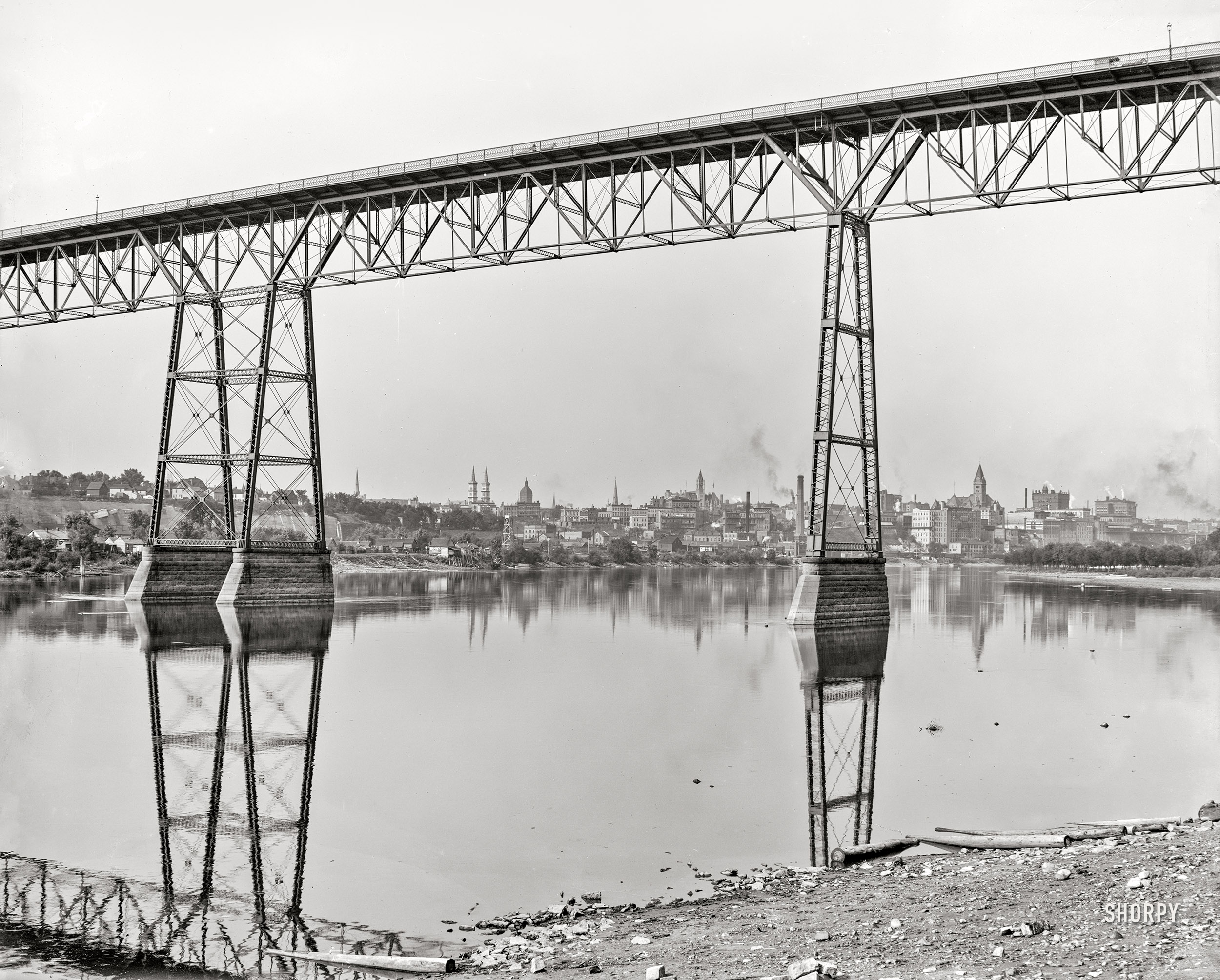 1905. "St. Paul and Mississippi River from under High Bridge." 8x10 inch dry plate glass negative, Detroit Photographic Company. View full size.