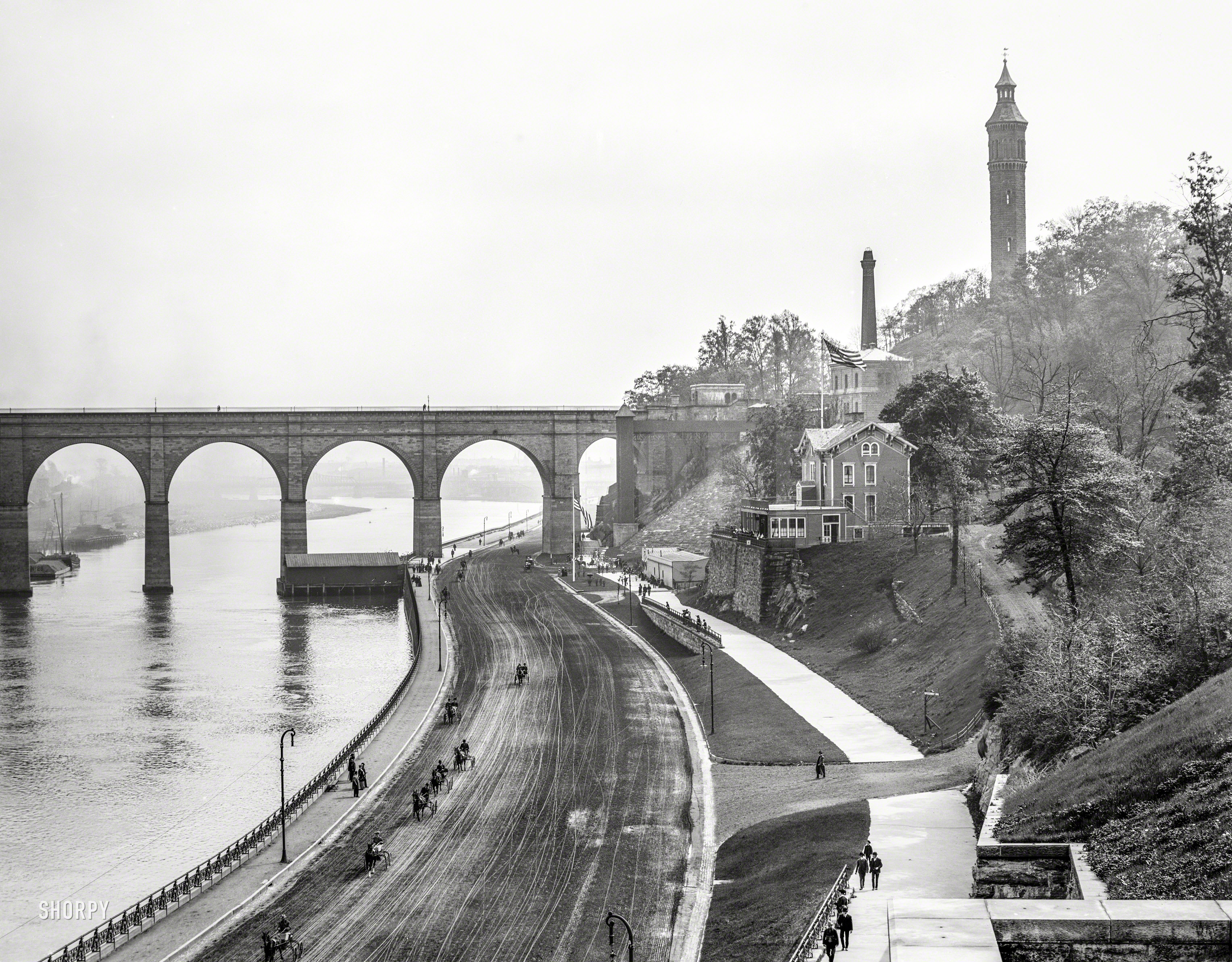 New York circa 1905. "High Bridge and the Speedway looking south." The 1840s aqueduct over the Harlem River, closed since 1970, is reopening next week after a $60 million restoration. 8x10 inch glass negative. View full size.
