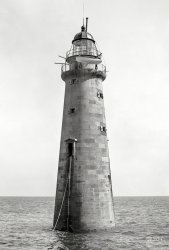 "Minot's Ledge Lighthouse, Boston, c. 1890-1899." A good design for those vacation home owners (and lighthouse keepers) averse to weekend guests or pizza circulars on the doorstep. Detroit Publishing Co. glass negative. View full size.