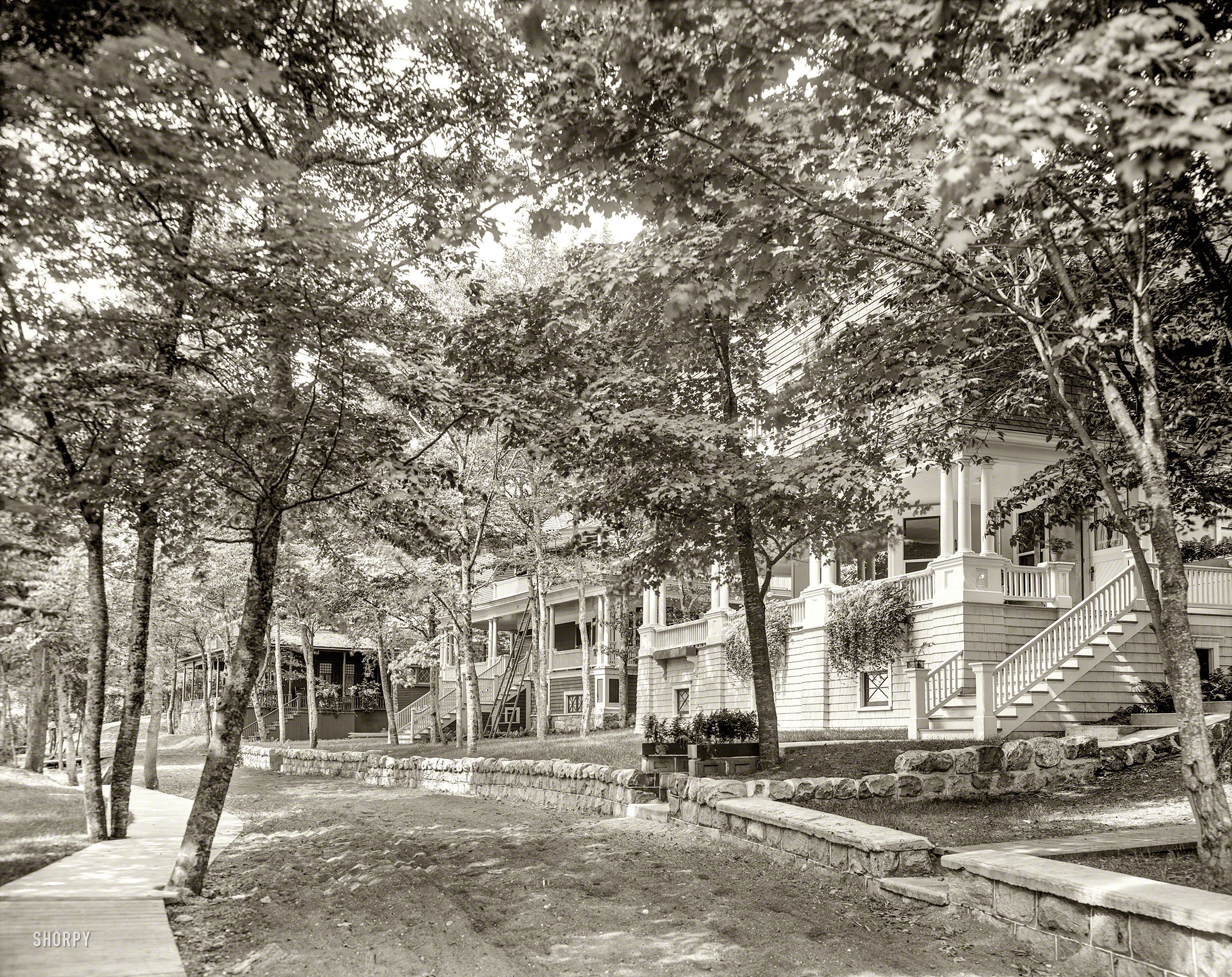 1906. "Cottages at Harbor Springs, Michigan." The resort community in its early years. 8x10 inch glass negative, Detroit Publishing Company. View full size.