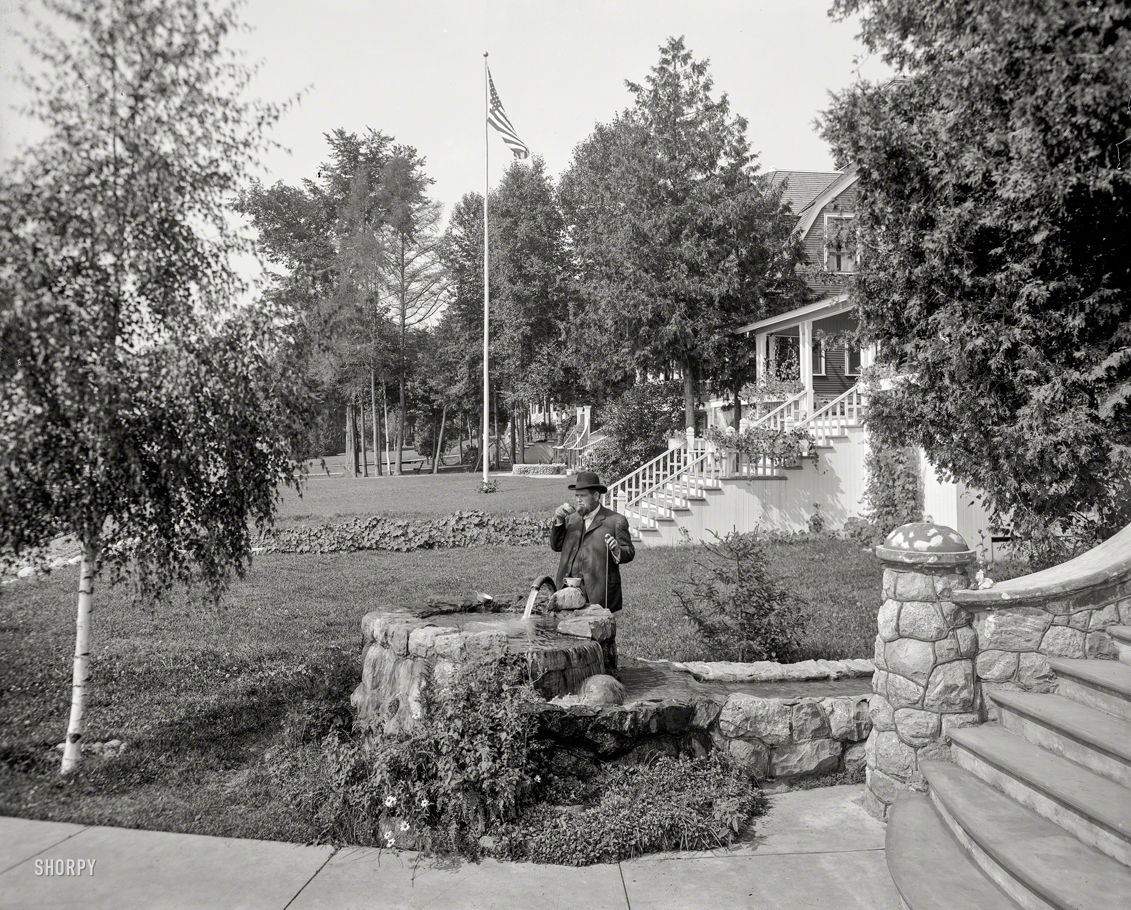 Harbor Springs, Michigan, circa 1906. "A flowing well in Wequetonsing." 8x10 inch dry plate glass negative, Detroit Publishing Company. View full size.