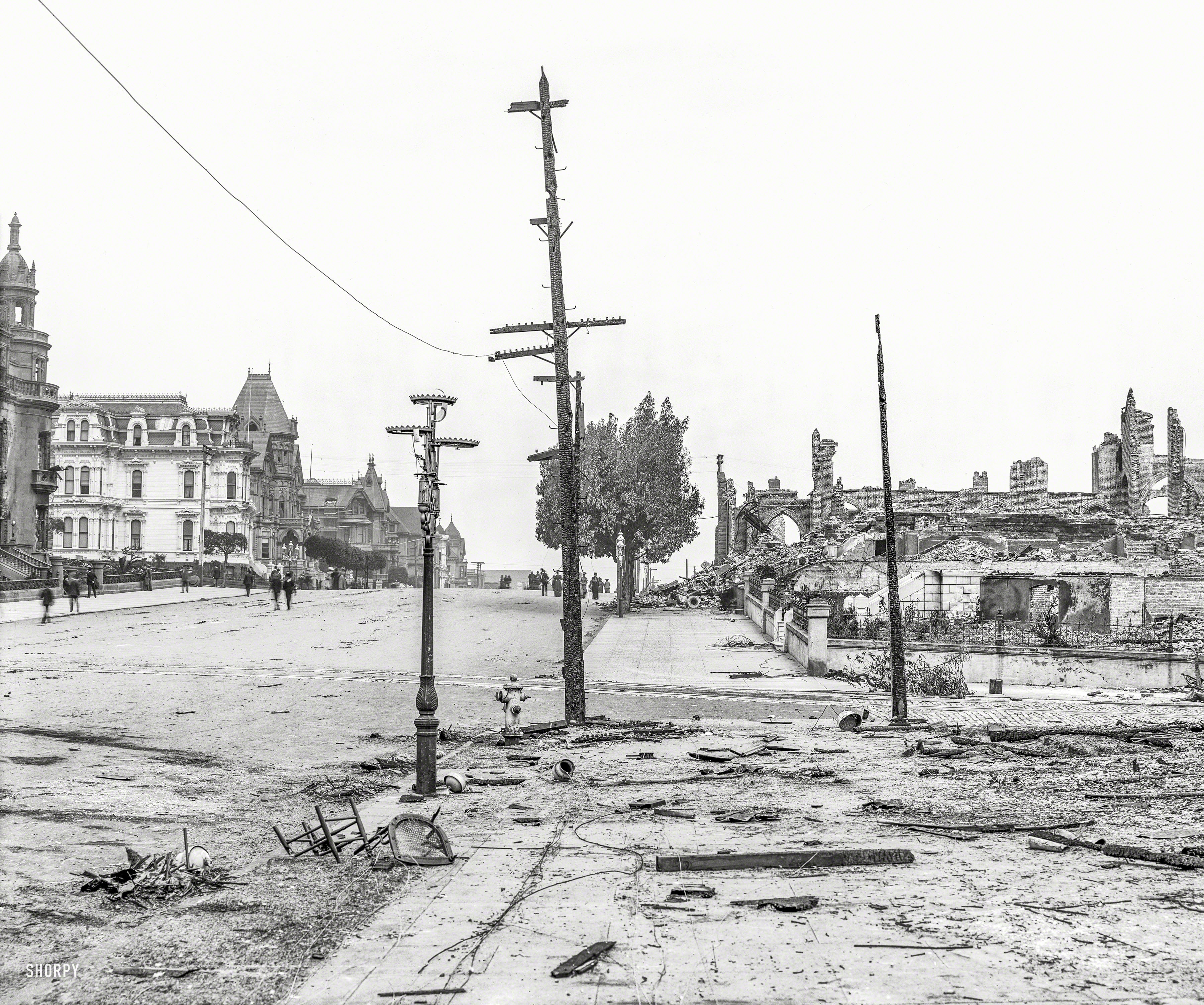 "Van Ness Avenue -- limit of fire, San Francisco." Aftermath of the devastating earthquake of April 1906.  8x10 inch glass negative. View full size.
