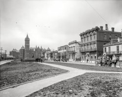 Circa 1906. "Elks Place, New Orleans, Louisiana." Brought to you by Anna Held. Forgotten New Orleans: The old criminal court building and parish prison in the background. 8x10 inch glass negative, Detroit Publishing Co. View full size.