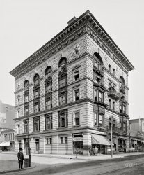 Hartford, Connecticut, 1907. "Hartford Life Insurance Co." Home to Duggan & Co. Druggists, purveyors of Moxie, and Sulphur & Molasses Kisses. 8x10 inch glass negative. View full size.