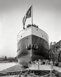 April 28, 1909. "Launching party, freighter Benjamin Noble, Wyandotte, Michigan." 8x10 glass negative, Detroit Publishing Company. View full size.
&nbsp; &nbsp; &nbsp; &nbsp; Top-heavy with a cargo of steel rails, the Benjamin Noble capsized in a squall 20 miles out from Duluth on April 14, 1914, vanishing into Lake Superior with the loss of all hands. After 90 years as a "ghost ship," its wreck was discovered at a depth of 400 feet off Knife Island in 2004, the front half buried in 40 feet of mud -- "heavily overloaded, just a submarine waiting to happen."