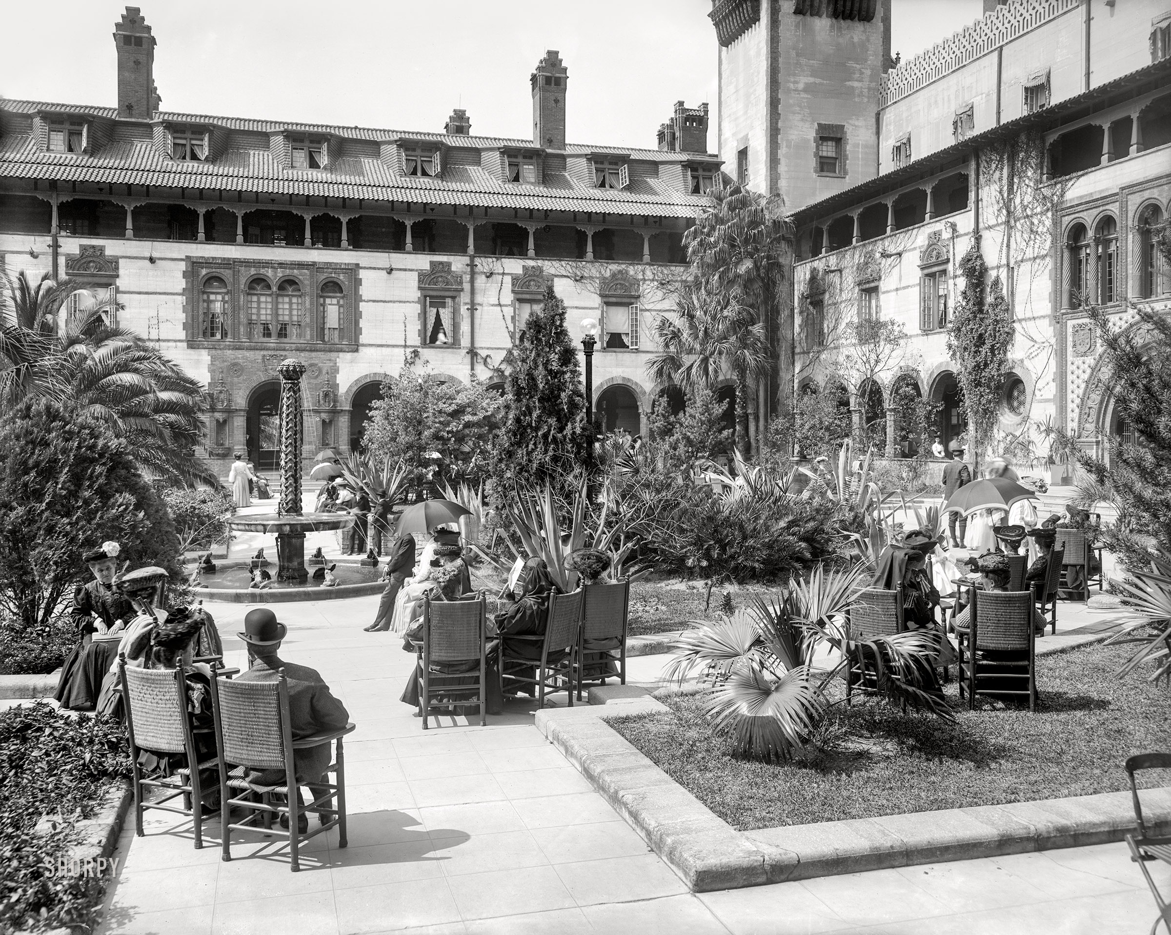 St. Augustine, Florida, circa 1905. "In the court of the Hotel Ponce de Leon." 8x10 inch dry plate glass negative, Detroit Photographic Company. View full size.