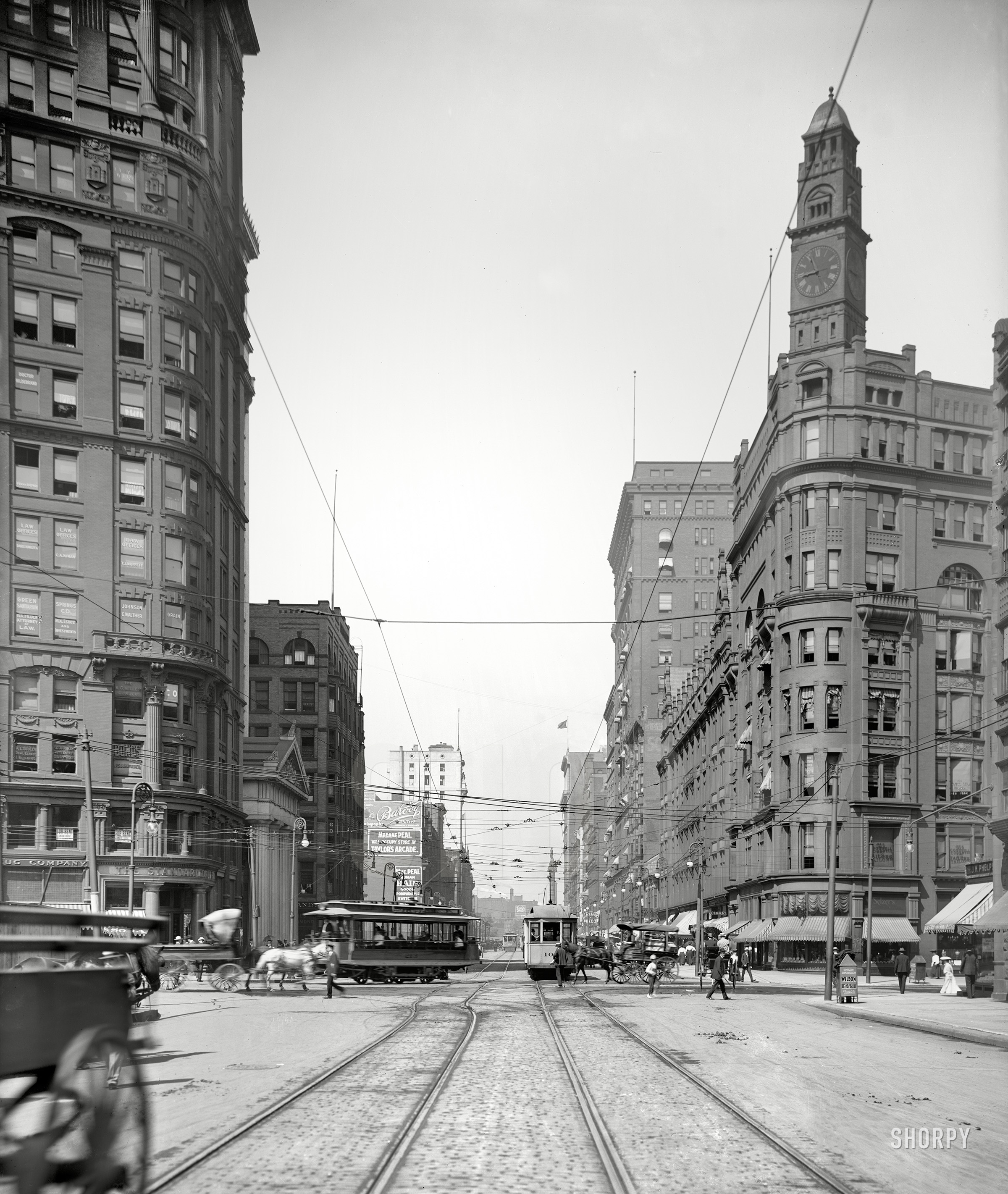 Circa 1905. "Euclid Avenue, Cleveland, O." The clock tower belongs to the Hickox Building (1890-1946), at the intersection with East Ninth Street. 8x10 inch dry plate glass negative, Detroit Publishing Company. View full size.