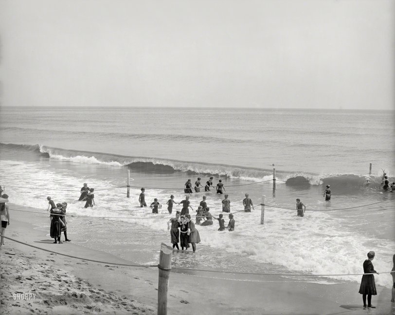 The Jersey Shore circa 1905. "In the surf at Asbury Park." Having a wonderful time; wish we were still here. 8x10 inch dry plate glass negative. View full size.
