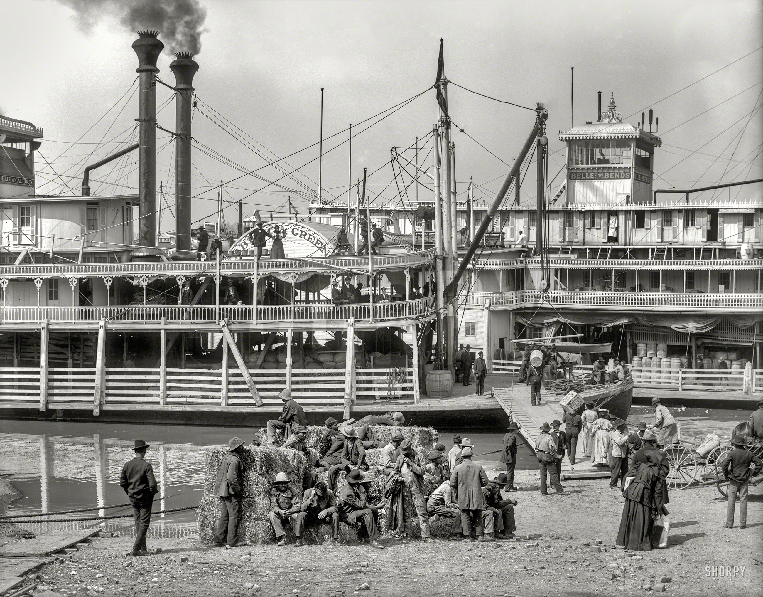 The Mississippi River circa 1906. "Steamboat landing at Vicksburg, Miss." Starring the paddlewheelers Belle of Calhoun and Belle of the Bends. 8x10 inch dry plate glass negative, Detroit Publishing Company. View full size.