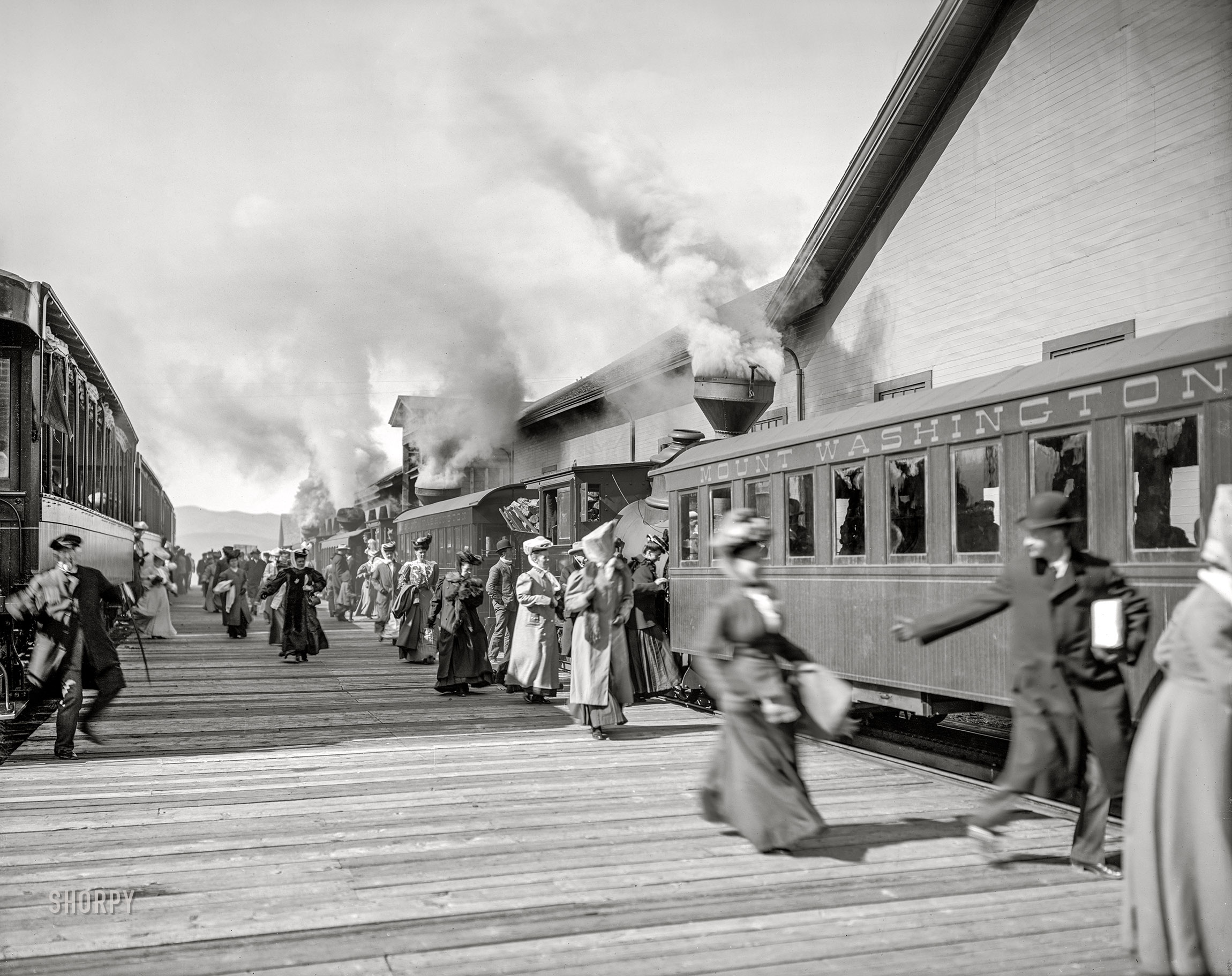 New Hampshire circa 1906. "Taking trains of Mount Washington Railway at base station, White Mountains." A cog railway to the highest peak in the Northeast. 8x10 inch dry plate glass negative, Detroit Publishing Company. View full size.