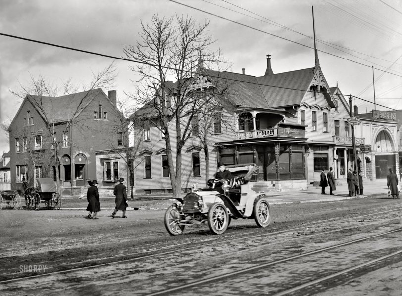 Detroit circa 1910. "Automobile on Jefferson Avenue at East Grand Boulevard." Backdropped by Moesta's Tavern, the city's "most famous east side saloon." 8x10 inch dry plate glass negative, Detroit Publishing Company. View full size.