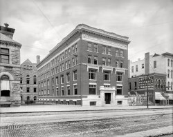 Circa 1907. "Y.M.C.A. -- Lansing, Michigan." With City Hall to the rear and cigars to the side. 8x10 inch dry plate glass negative, Detroit Publishing Company. View full size.