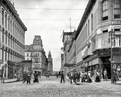 Toledo, Ohio, circa 1905. "Madison Avenue from Summit Street." Featuring the Hotel Boody and a number of Painless Dentists, as well as a nice display of wallpaper and "decorative materials." 8x10 glass negative. View full size.