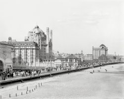 Atlantic City circa 1906. "Boardwalk and big hotels (the Marlborough-Blenheim and Traymore) from Young's new pier." At left, the attraction "Creation of the World." 8x10 inch glass negative, Detroit Publishing Co. View full size.