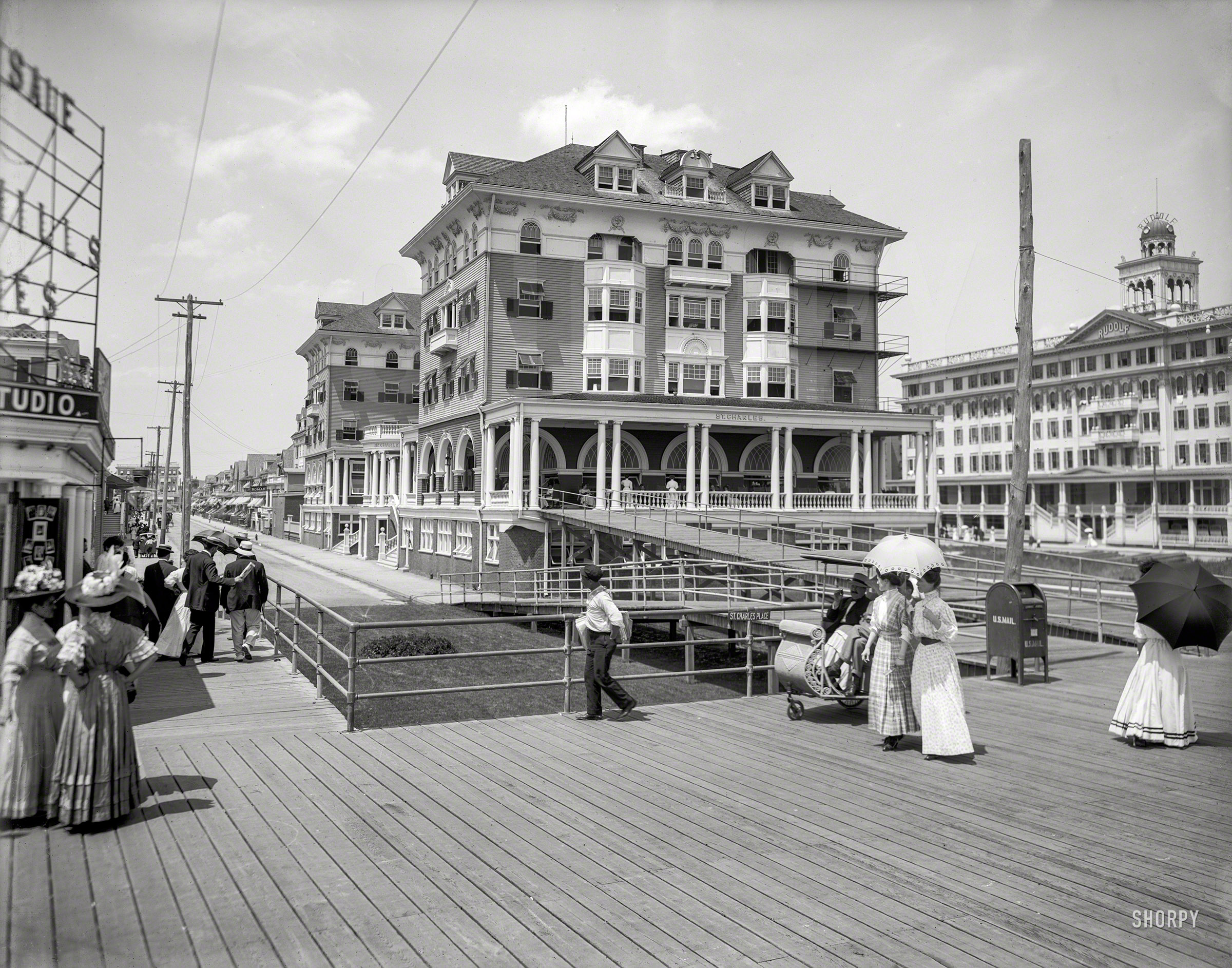The Jersey Shore circa 1910. "St. Charles and Rudolf  hotels, Atlantic City." From the heyday of the Boardwalk, parasol and rolling chair. View full size.