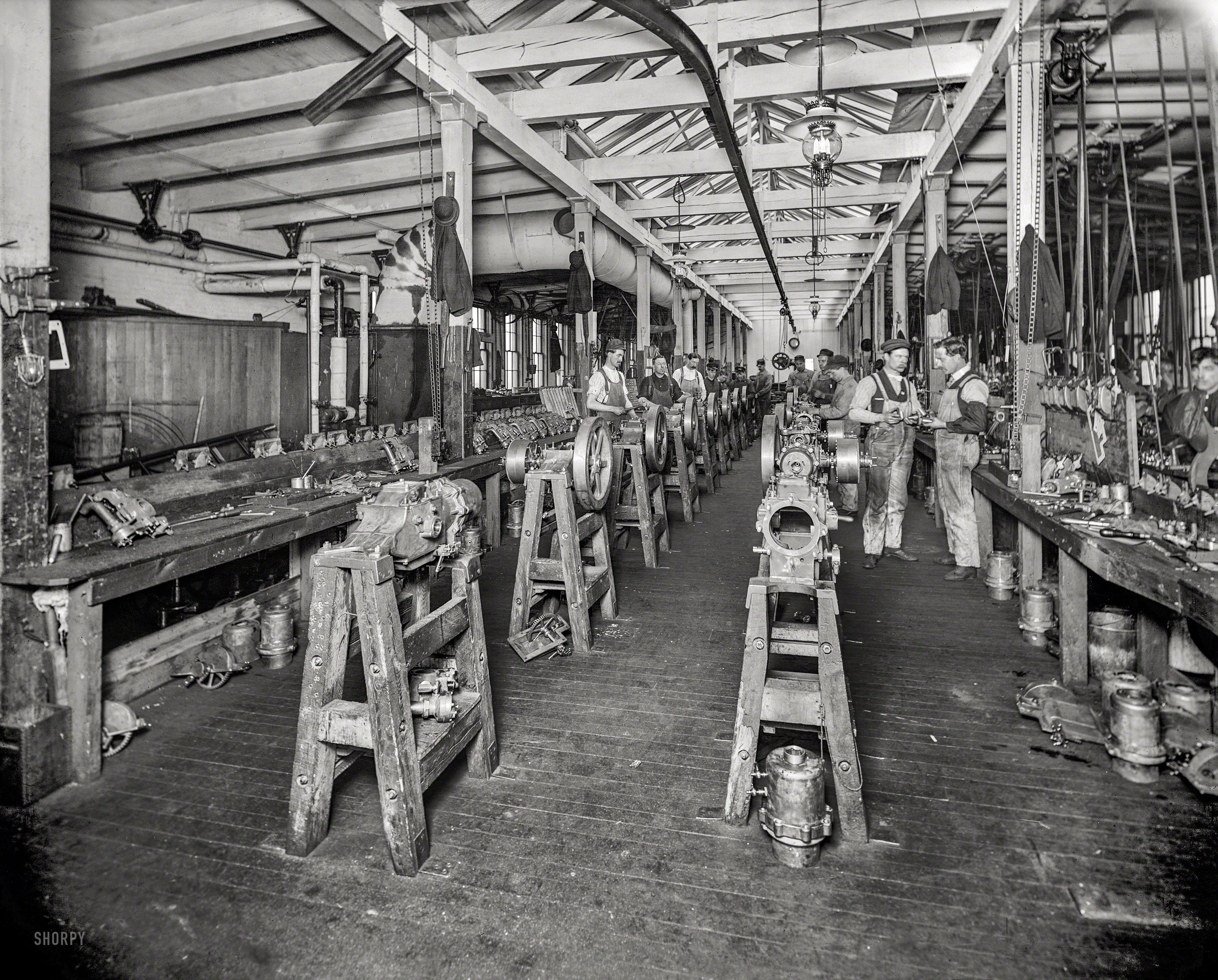 November 1903. "Assembling room, Leland & Faulconer Manufacturing Co., Detroit. Men working in foundry and machine shop that produced automobile engines and merged with Cadillac Motor Co. in 1905." 8x10 inch dry plate glass negative, Detroit Publishing Company. View full size.