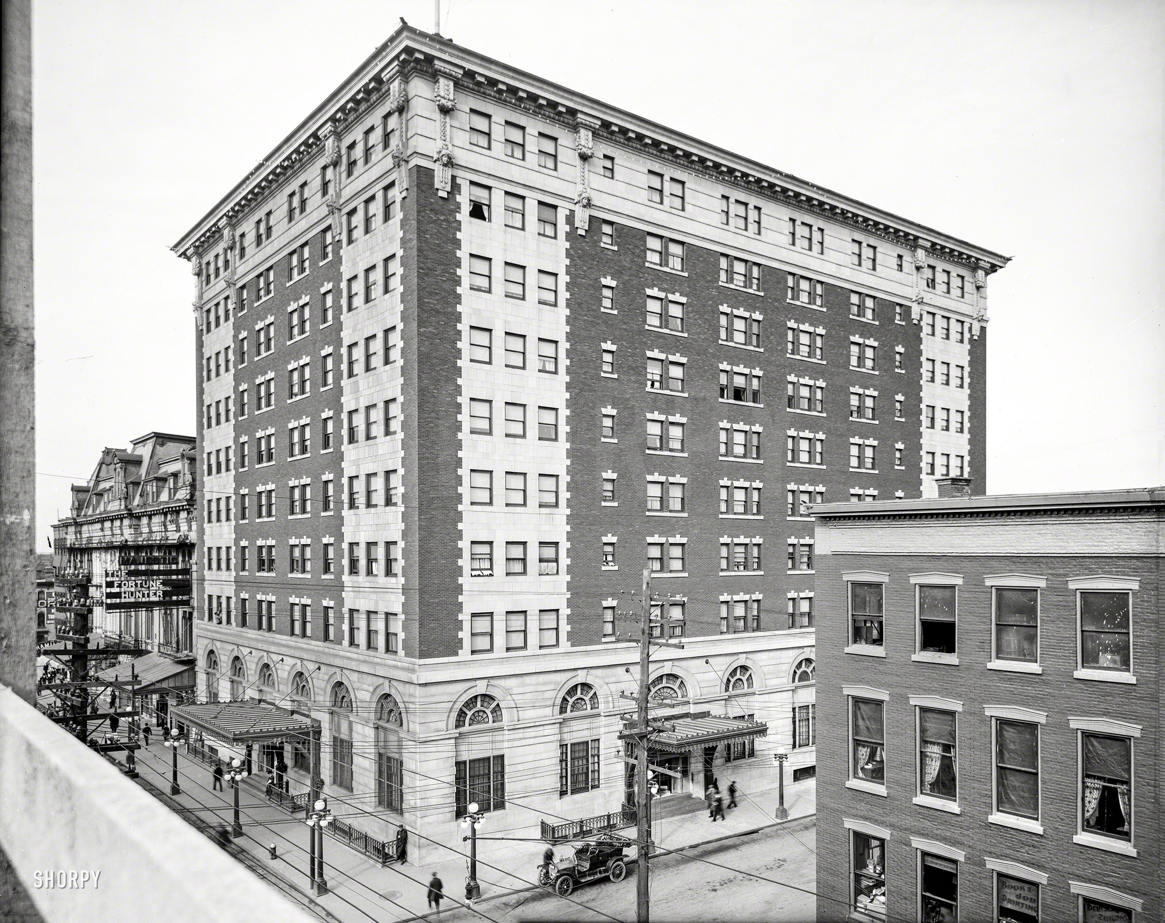 Utica, New York, circa 1910. "Hotel Utica." Playing next door at the Majestic: "The Fortune Hunter." 8x10 inch dry plate glass negative. View full size.