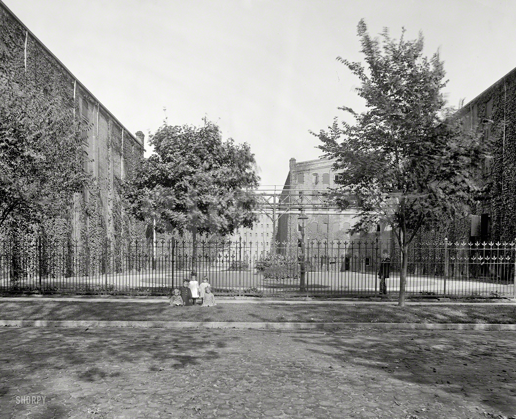 &nbsp; &nbsp; &nbsp; &nbsp; Little Ginny, Brandy, Bourbonnie, Tequila and Martini.
Circa 1910. "View between warehouses, Walker distillery, Walkerville, Ontario." 8x10 inch dry plate glass negative, Detroit Publishing Company. View full size.