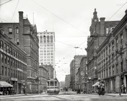 Detroit circa 1910. "Griswold Street looking toward Ford Building." Our title comes from the tailor shop at left. 8x10 inch glass negative. View full size.