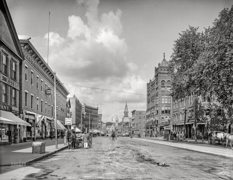 1908. "Main Street -- Nashua, New Hampshire." At right, offices of the Nashua Telegraph and Fletcher's Optical Parlors. 8x10 inch glass negative, Detroit Publishing Company. View full size.
