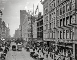 New York circa 1908. "Twenty-Third Street east from Sixth Avenue." Featured players in this picture include the McCreery dry goods store, Lilliputian Bazaar and our old friend the Flatiron Building. 8x10 glass negative. View full size.