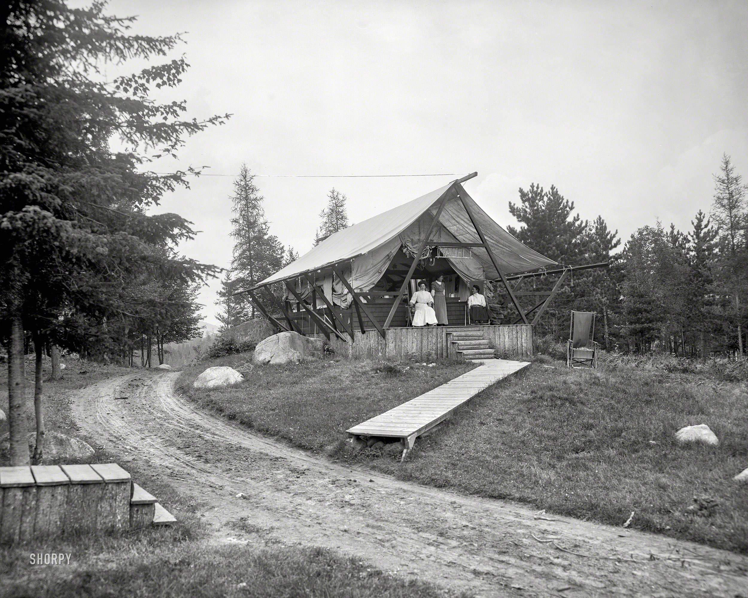 1909. "A typical house tent, Ray Brook sanatorium, Adirondack Mountains." Taking the "fresh air" cure on the grounds of the New York State Hospital for Incipient Pulmonary Tuberculosis. 8x10 inch glass negative. View full size.