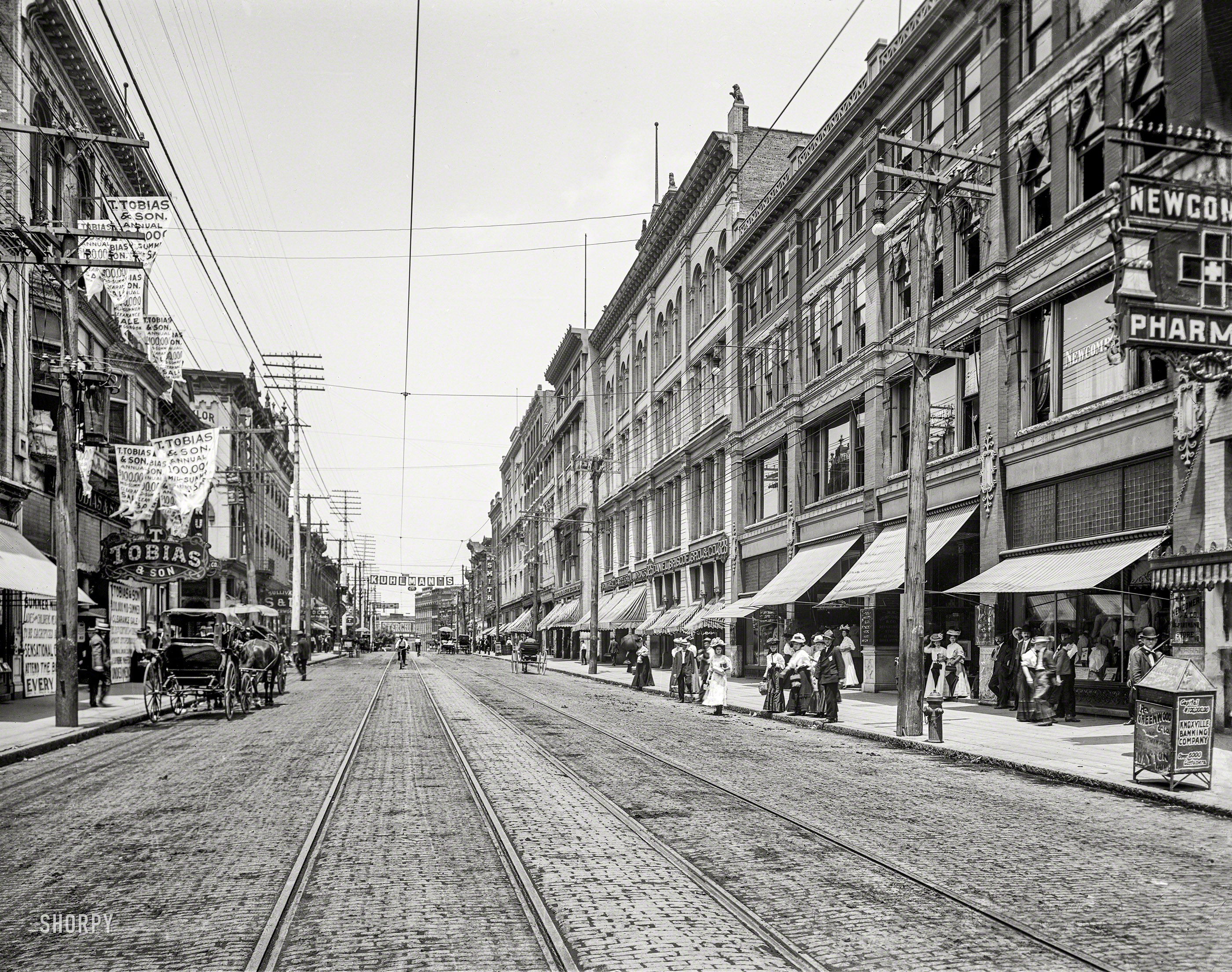 Knoxville, Tennessee, circa 1905. "Gay Street north from Wall Street." Where close inspection will reveal subtle indications of a mid-summer clearance at T. Tobias & Son. 8x10 inch glass negative, Detroit Publishing Company. View full size.