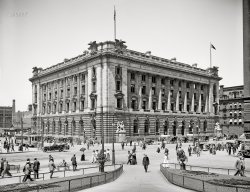 Cleveland, Ohio, circa 1912. "U.S. Post Office, Custom House and Court House, Public Square." 8x10 inch dry plate glass negative, Detroit Publishing Company. View full size.
JaywalkersI love these old pictures from before crosswalks had even been thought of. "I want to be over there. The shortest way is diagonally across the intersection. Off I go."
+104Below is the same perspective from July of 2016.
Little Red WagonSo is this a little red wagon and someone using it to scoot?
Cars 23, horses 1, pushcarts 1It's just 1912, but the competitive battle between four-hoofed and four-wheeled transportation is pretty much over.
(The Gallery, Cleveland, DPC, Streetcars)