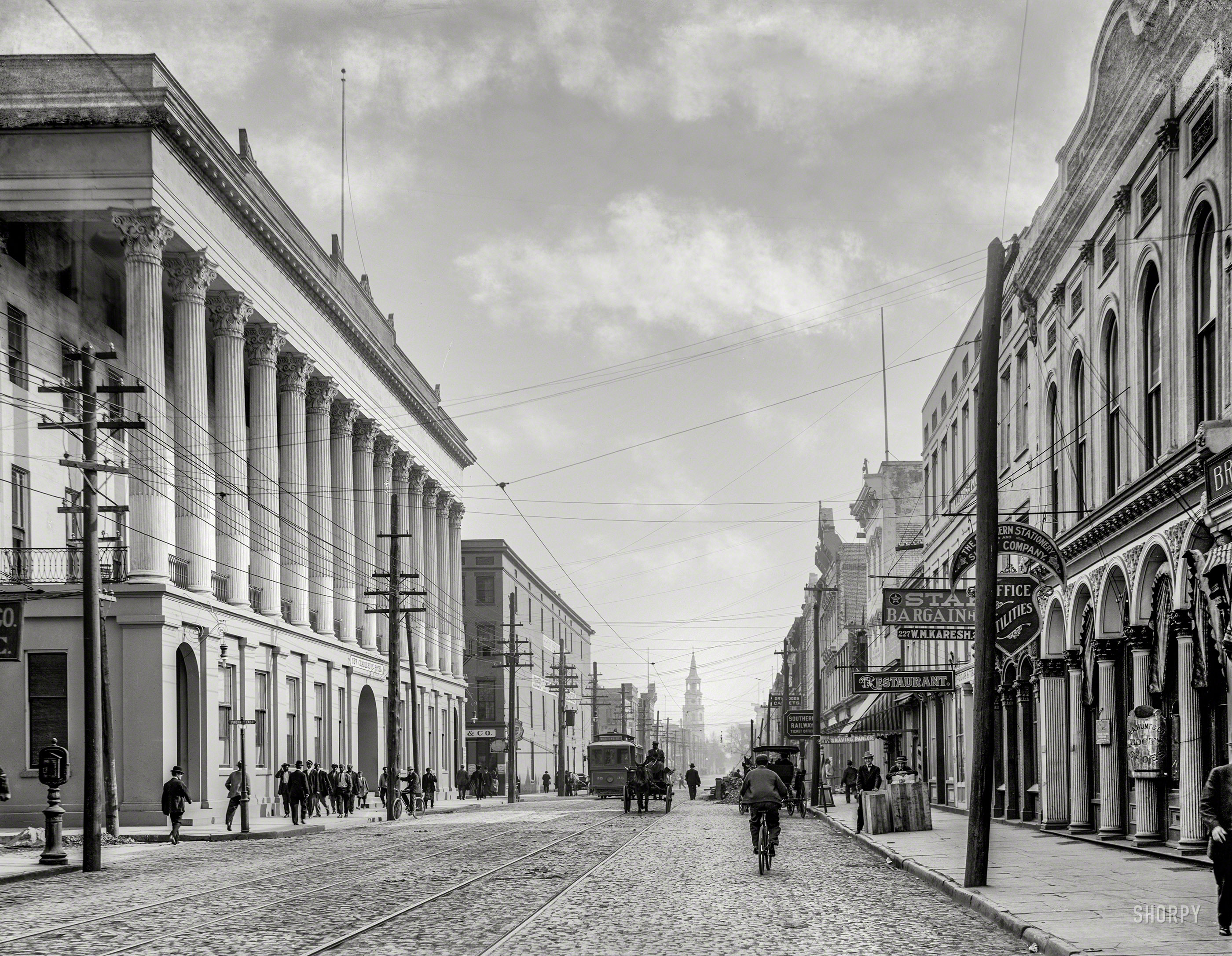 Charleston, South Carolina, circa 1910. "New Charleston Hotel and Meeting Street." Close by: a bootery, office supplies and "Shaving Parlor." 8x10 inch dry plate glass negative, Detroit Publishing Company. View full size.