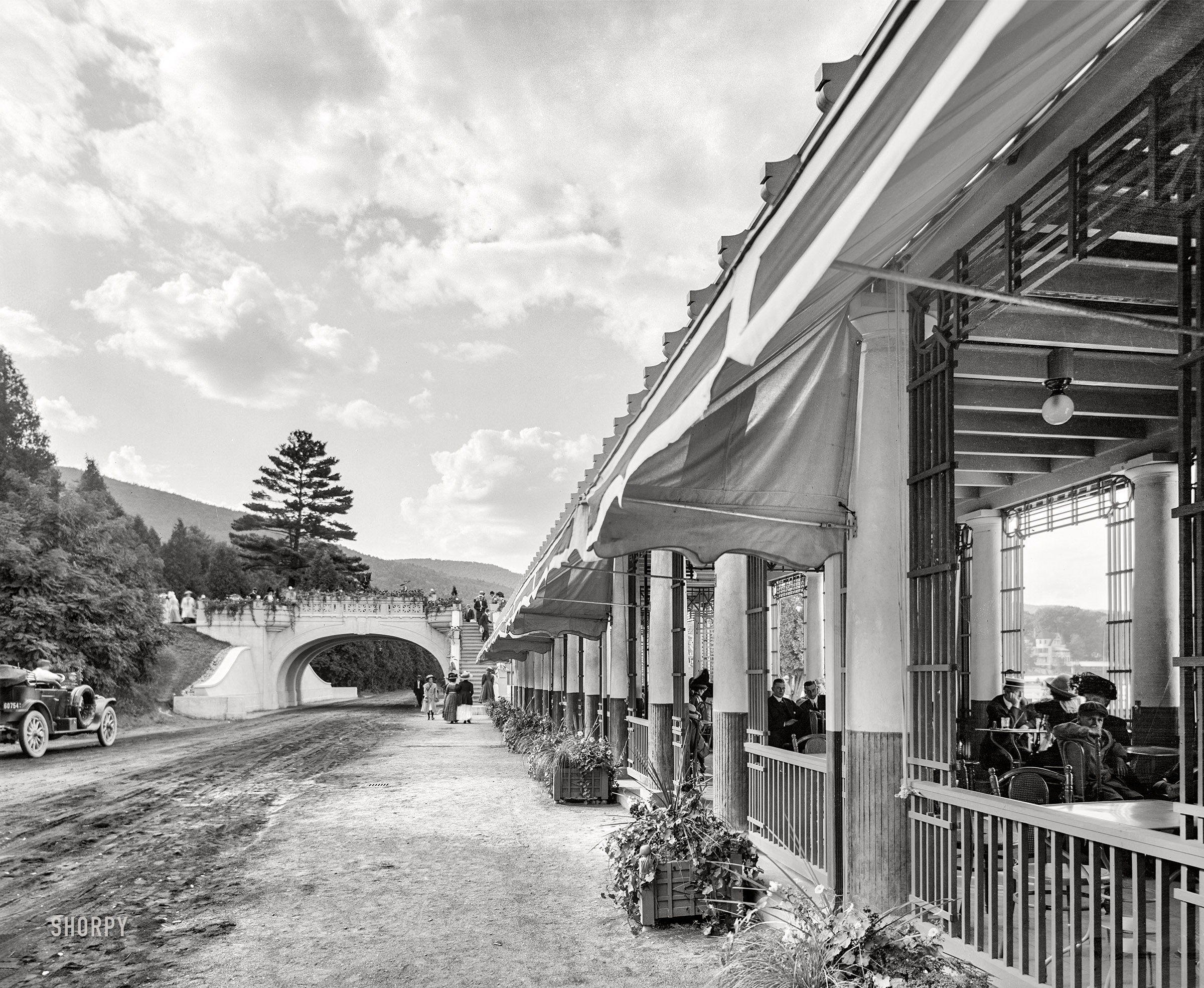 Lake George, New York, circa 1911. "The Pergola-Casino, Fort William Henry Hotel." Two years après-feu. 8x10 inch dry plate glass negative, Detroit Publishing Company. View full size.
