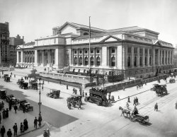 Circa 1912. "New York Public Library building." With a variety of motorized conveyances. 8x10 glass negative, Detroit Publishing Co. View full size.
Libraries and carriagesI wonder if 100 years from now, whether Shorpy will display a similar photo that shows how libraries became as obsolete as horse-drawn carriages?
Will e-books have the same effect on these magnificent edifices as the internal combustion engine had on the carriages?
Hold On To Your HatThe building at the extreme left in this photo is still with us today. It was known as the Knox Hat Building, standing at 452 5th Avenue, it was built in 1902 as the headquarters of one of the Country's largest and most famous headgear manufacturers. A surrounding high rise glass tower was added when it was known as the Republic Bank Building. The major tenant and new owner is now another bank, HSBC.
He kindly stopped for meIn the bottom right corner of the photo there is a wagon hurrying along.  Is that a coffin in the back?
[Whooooo knows? -tterrace]
Knox HatsWhile so much has changed in the past 102 years, one survivor in addition to the library itself is the building at the extreme left. Built in 1902 in the Beaux-Arts style, and designed by the same architect as Grant's Tomb, it was the headquarters of the Knox Hat Company for many years (Knox also had a huge factory in Brooklyn)and is still known as the Knox Hat Building even though the company's long gone.  HSBC Bank now uses it for offices and has an enormous highrise building crowding it on two sides.
Library Lions"Fortitude" on the left, north side; "Patience" on the right, south side.
http://www.nypl.org/help/about-nypl/library-lions
A Very Good YearI'm always on the lookout for photos taken in 1912, because that's the year that my Mom was born. She's 102 years old, and still lives on her own and is sharp as a tack. When I see a photo like this, I try to imagine all of the things she has seen in her lifetime, and it helps me visualize the work into which she was born.
The New York Public Library has hardly changed a bit, except I did notice that the facade in the 1912 views must have been unfinished, for today, 6 statues grace the frieze on the colonnade, rather than the single one that was there then. 
(The Gallery, Cars, Trucks, Buses, DPC, NYC)