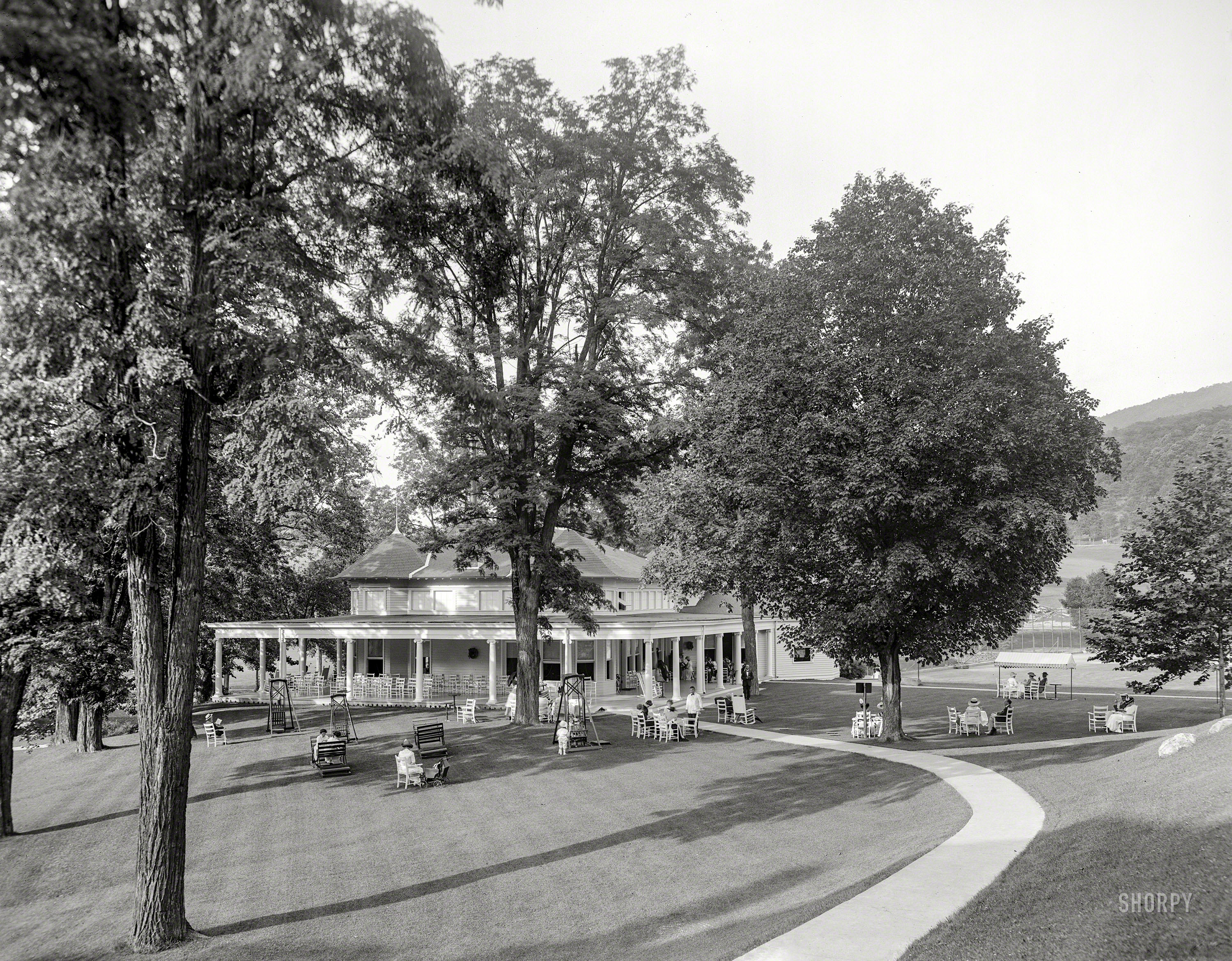 Virginia Hot Springs circa 1912. "The Homestead -- five o'clock tea at the club house." 8x10 inch glass negative, Detroit Publishing Company. View full size.