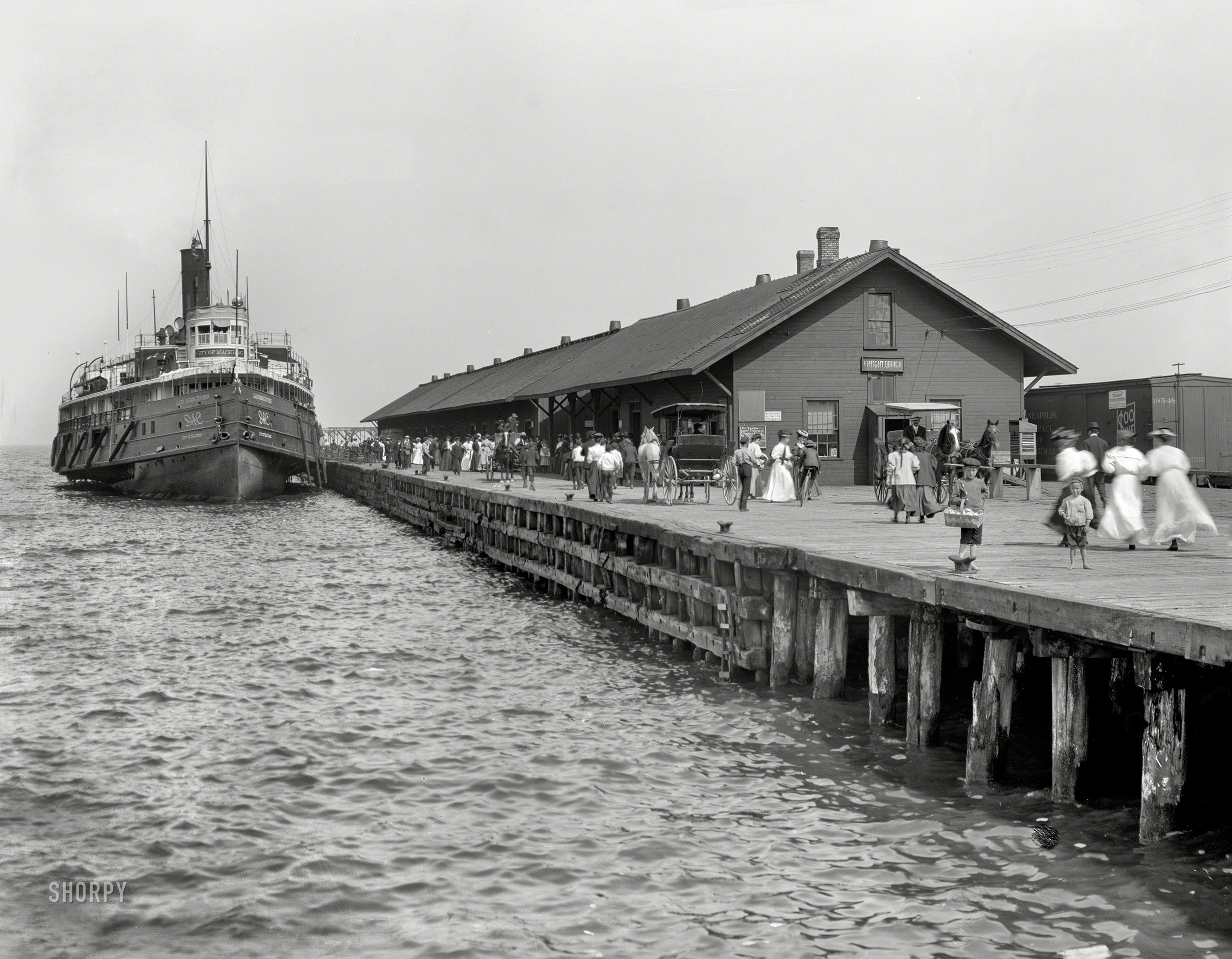 Circa 1905. "D.& C. steamer at dock, St. Ignace, Michigan." The Detroit & Cleveland Navigation Company's City of Mackinac. 8x10 inch dry plate glass negative. View full size.