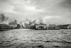 Norfolk, Virginia, circa 1917. "Merchants and Miners Wharf." Over at the pants factory: GIRLS WANTED. 8x10 inch dry plate glass negative. View full size.