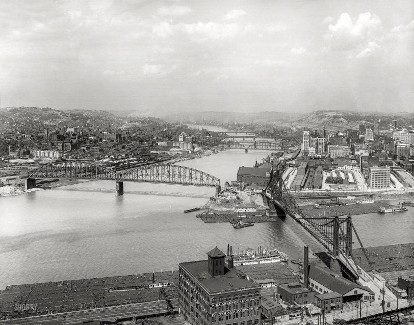 Pittsburgh circa 1912. "Coal barges at 'The Point' -- Confluence of Allegheny and Monongahela at start of Ohio River." A bounty of seven spans for you bridge identifiers out there. 8x10 inch dry plate glass negative. View full size.
