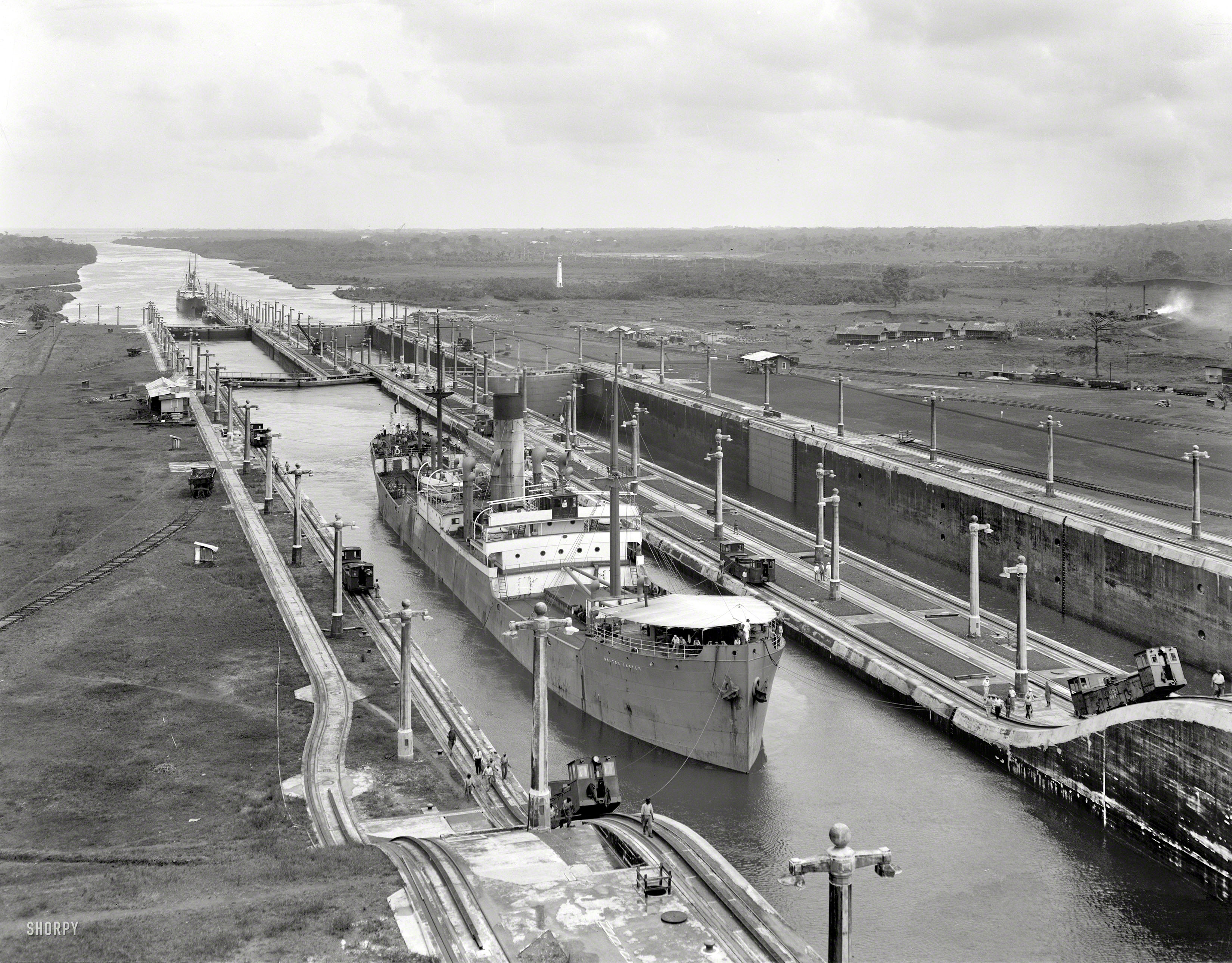 Circa 1915. "Bolton Castle in Gatun Locks, west chamber, Panama Canal." Just the thing to float your boat. 8x10 inch dry plate glass negative. View full size.