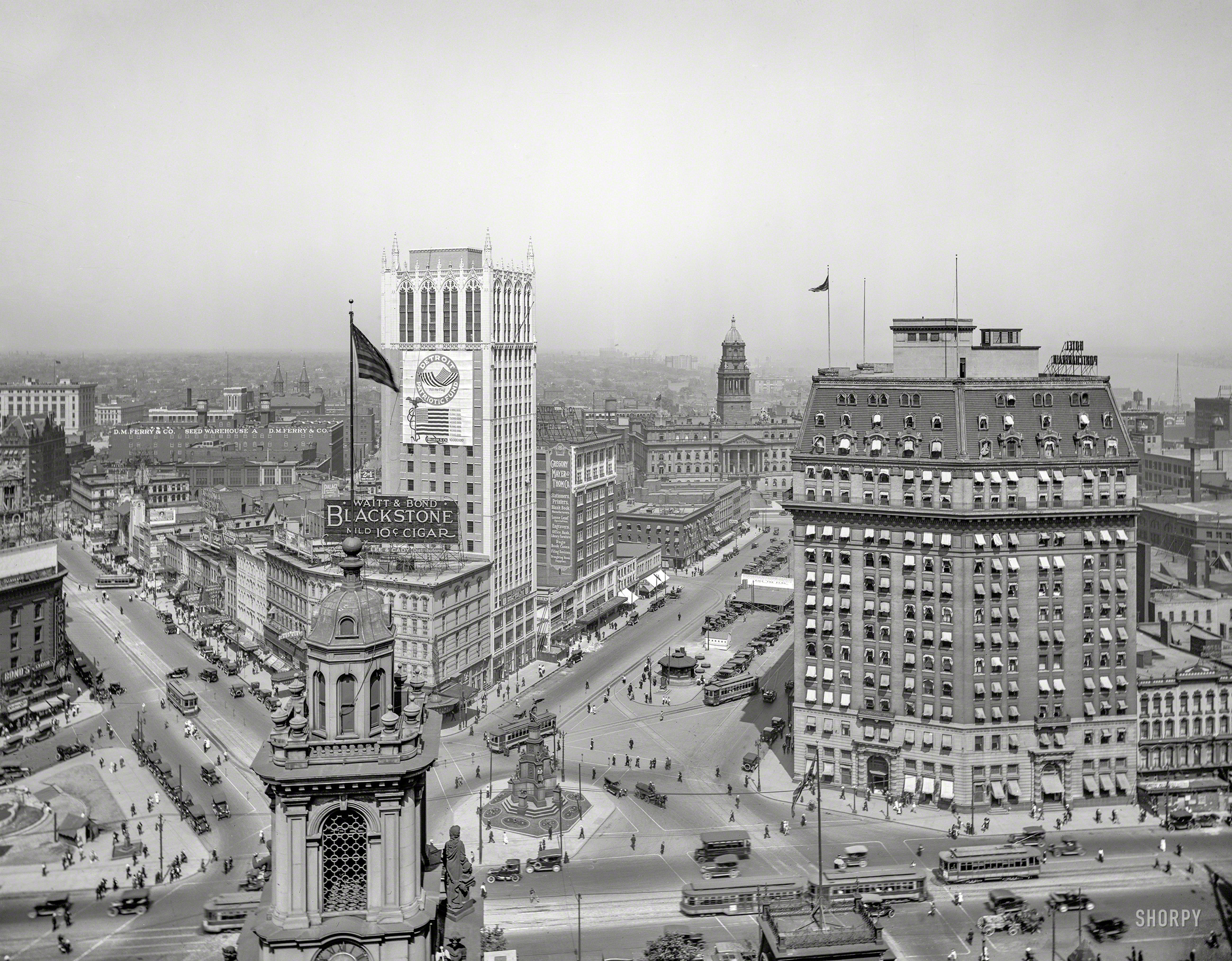 Circa 1918. "The heart of Detroit." An aerial view of the Campus Martius from the Dime Bank, taking in landmarks including Detroit City Hall in the foreground, the Real Estate Exchange, Soldiers' and Sailors' Monument, Hotel Pontchartrain, Wayne County Building, Cadillac Square and the Cadillac Chair. 8x10 glass negative, Detroit Publishing Co. View full size.