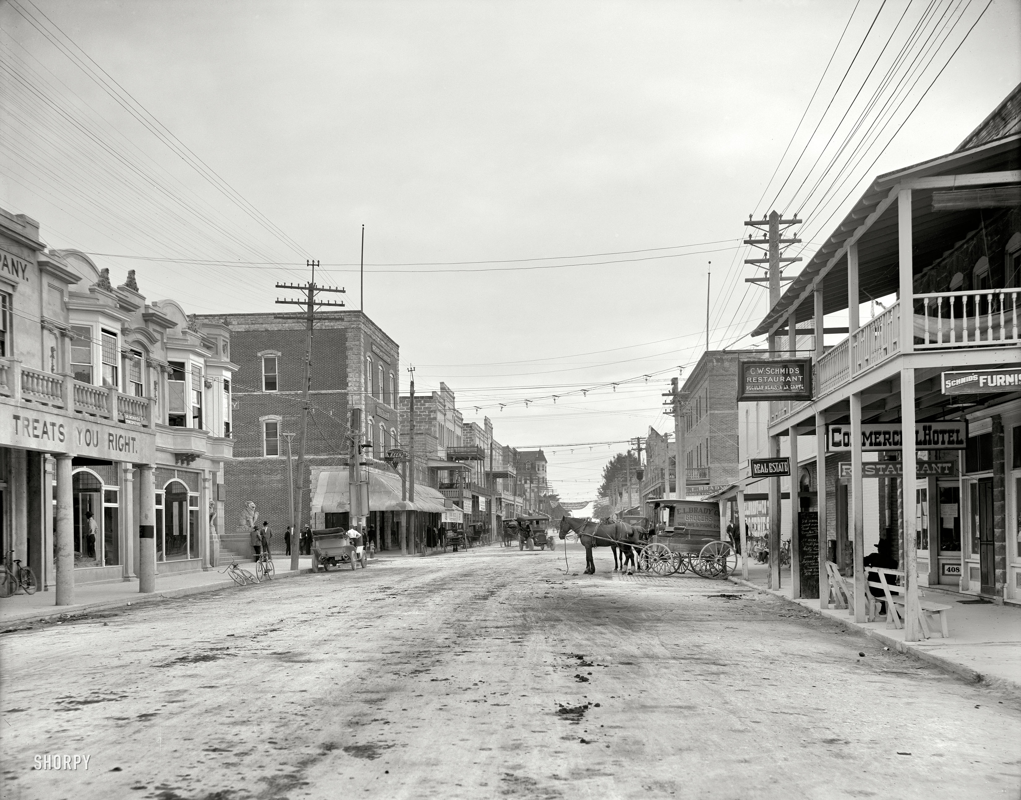 Circa 1908. Who would care to hazard a guess as to the location of this bustling metropolis? Extra points for Street View. Detroit Publishing Co. View full size.

UPDATE: The guesses as to the location of "Anytown, USA" (this post's original title) were, quite literally, all over the map -- from Deadwood to Buffalo to Whitehouse, Ohio. Many incorrect guesses for Titusville, Florida. The correct answer, and original caption: "12th Street, looking east, Miami, Florida." 