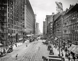 Chicago circa 1910. "State Street, south from Randolph." On the left we see the Masonic Temple and Marshall Field department store buildings. 8x10 inch glass negative. View full size.
