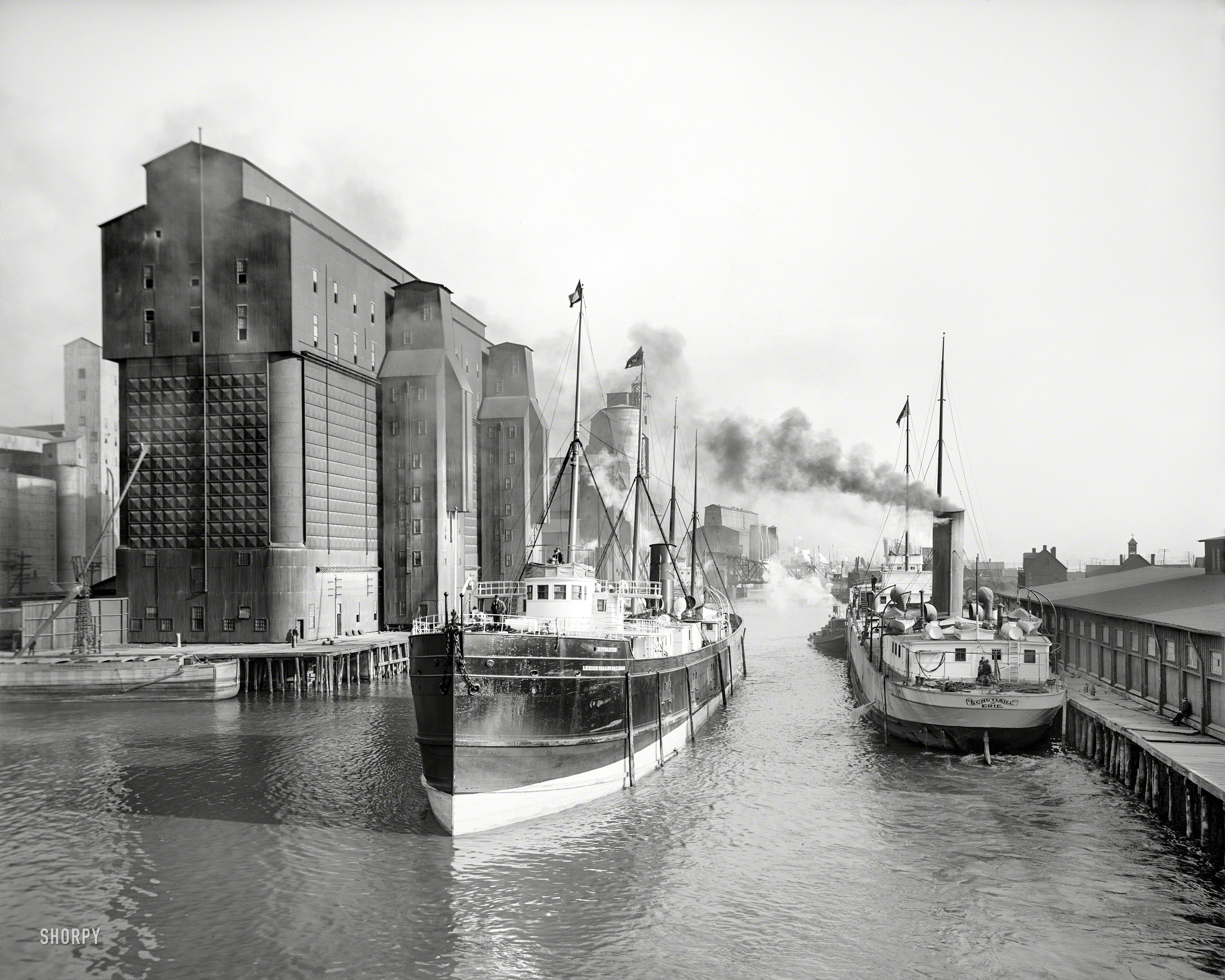 The Buffalo River, city ship canal and flour mill elevators circa 1911. "A busy section of the canal -- Buffalo, N.Y." 8x10 inch glass negative. View full size.