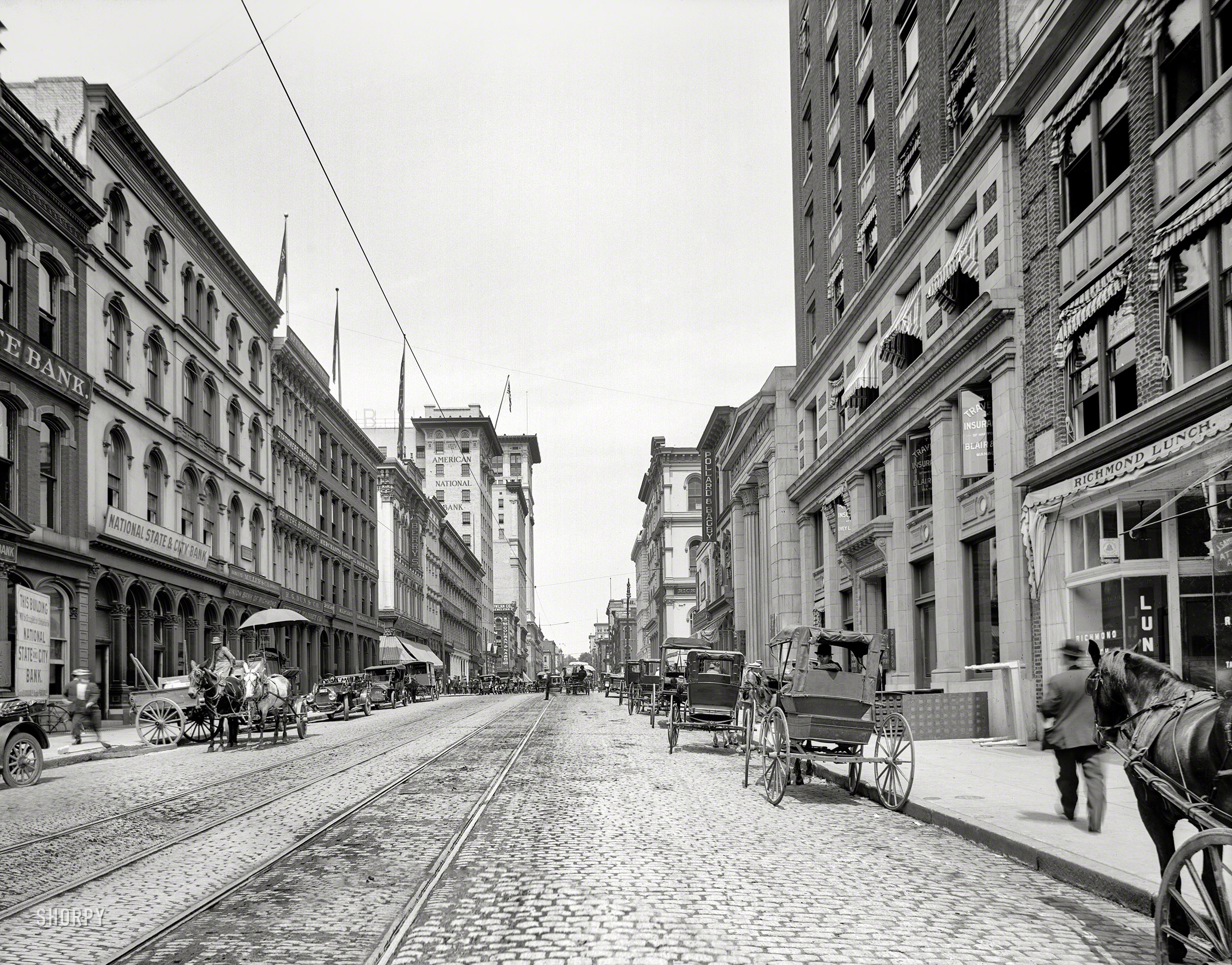 Richmond, Virginia, circa 1912. "Main Street west from Twelfth." A rank of banks. 8x10 inch dry plate glass negative, Detroit Publishing Company. View full size.