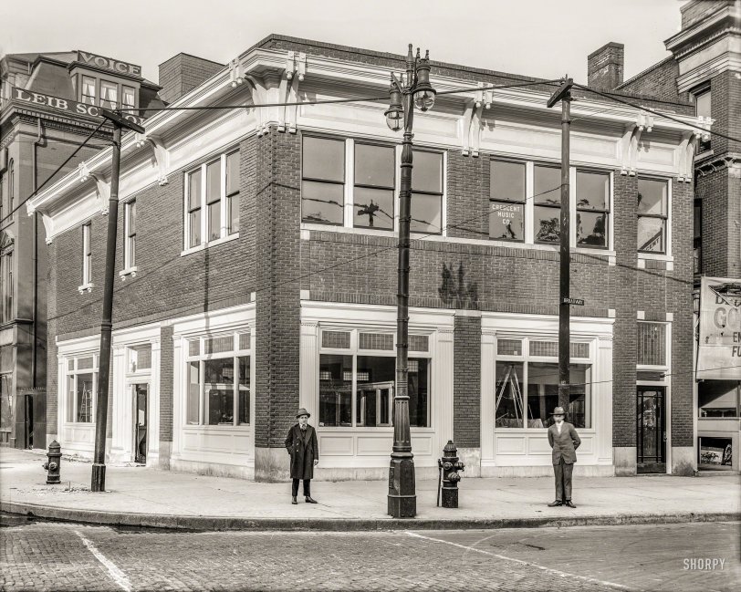 Detroit circa 1916. "Dime Bank branch, Broadway &amp; Grand Circus Park." Co-starring the Crescent Music Co. and a fine-looking carbon-arc streetlight. 8x10 inch dry plate glass negative, Detroit Publishing Company. View full size.
